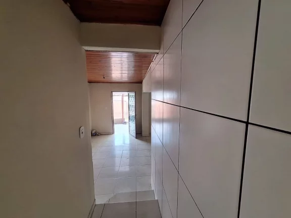 Imagem Casa com 91m², dois dormitórios, garagem, Lomba Tarumã, Viamão/RS.