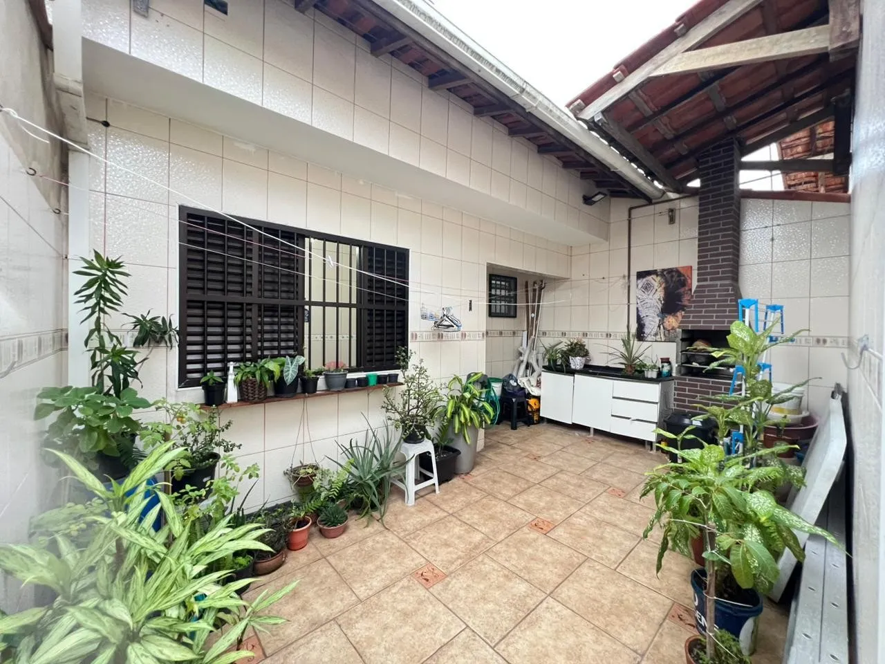 Imagem Casa para Venda em Praia Grande, Real, 2 dormitórios, 1 suíte, 1 banheiro, 2 vagas