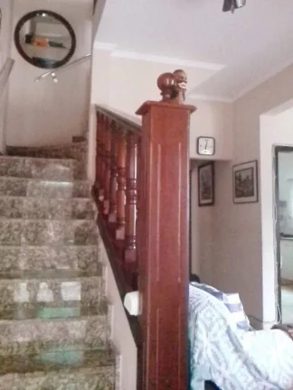 Imagem Sobrado com 4 dormitórios à venda, 216 m² por R$ 750.000,00 - Caiçara - Praia Grande/SP
