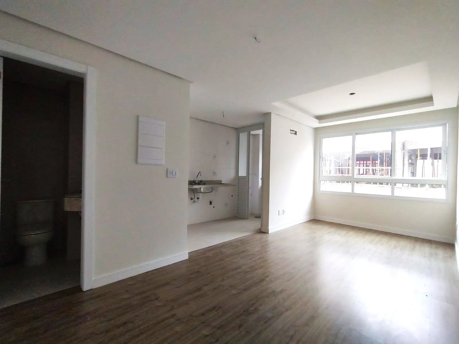 APARTAMENTO 1 DORMITÓRIO COM SUÍTE, COZINHA AMERICANA, LAVABO E AMPLO LIVING NO BOM FIM!
