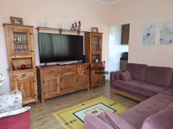 Foto do imóvel Casa com 3 dormitórios à venda, 125 m² por R$ 800.000,00 - Aviação - Praia Grande/SP