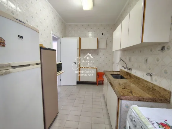 Imagem Imperdível! Apartamento de 3 quartos com suíte e 2 salas em Pitangueiras, Guarujá-SP. 100m² de conforto e elegância.