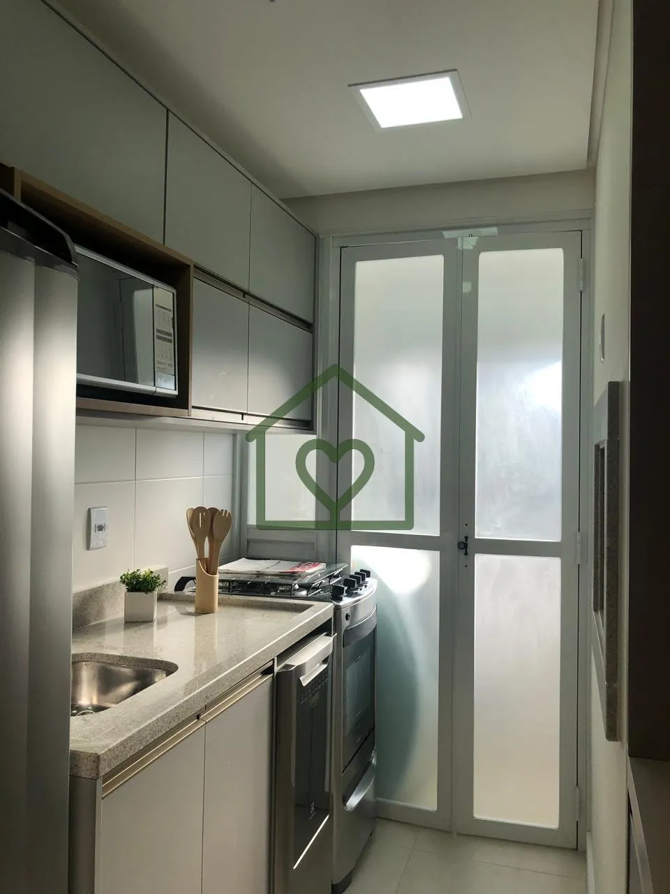 Imagem Apartamentos de 1 dormitório com suíte e lavabo, living para dois ambientes, cozinha com churrasqu...
