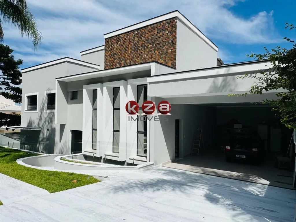 Imagem Casa de Luxo em Condomínio: 5 suítes, 5 salas, 9 banheiros, 4 vagas na cidade de Valinhos-SP, Condomínio Vale do Itamaracá - 760m².