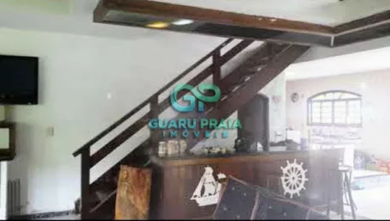 Imagem Casa com 6 quartos sendo 4 suítes, sala de jantar, sala de estar, sala de TV, 5 banheiros, cozinha armário planejado, lavanderia, churrasqueira, piscina, lindo jardim arborizado