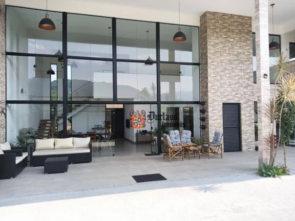 Foto do imóvel Sobrado com 4 dormitórios à venda, 360 m² por R$ 1.975.000,00 - Jardim Carolina - Ubatuba/SP