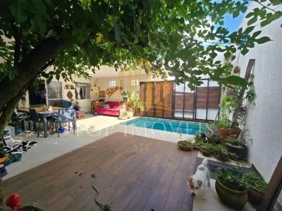 Foto do imóvel Casa em condomínio fechado, 2 dormitorios, com piscina aquecida, area gourmet Repleto de Planejados em Estrada Velha Rio São Paulo