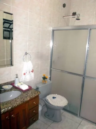 Imagem CASA COM 4 DORMITORIOS (1 SUITES)