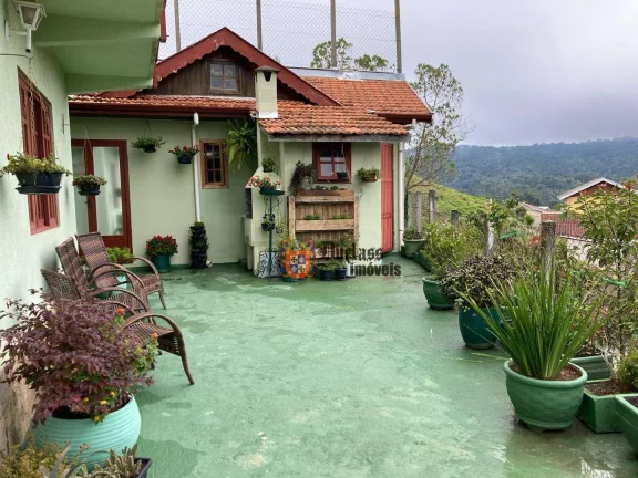 Imagem Sobrado com 4 dormitórios à venda, 259 m² por R$ 1.200.000,00 - Jardim Guararema - Campos do Jordão/SP
