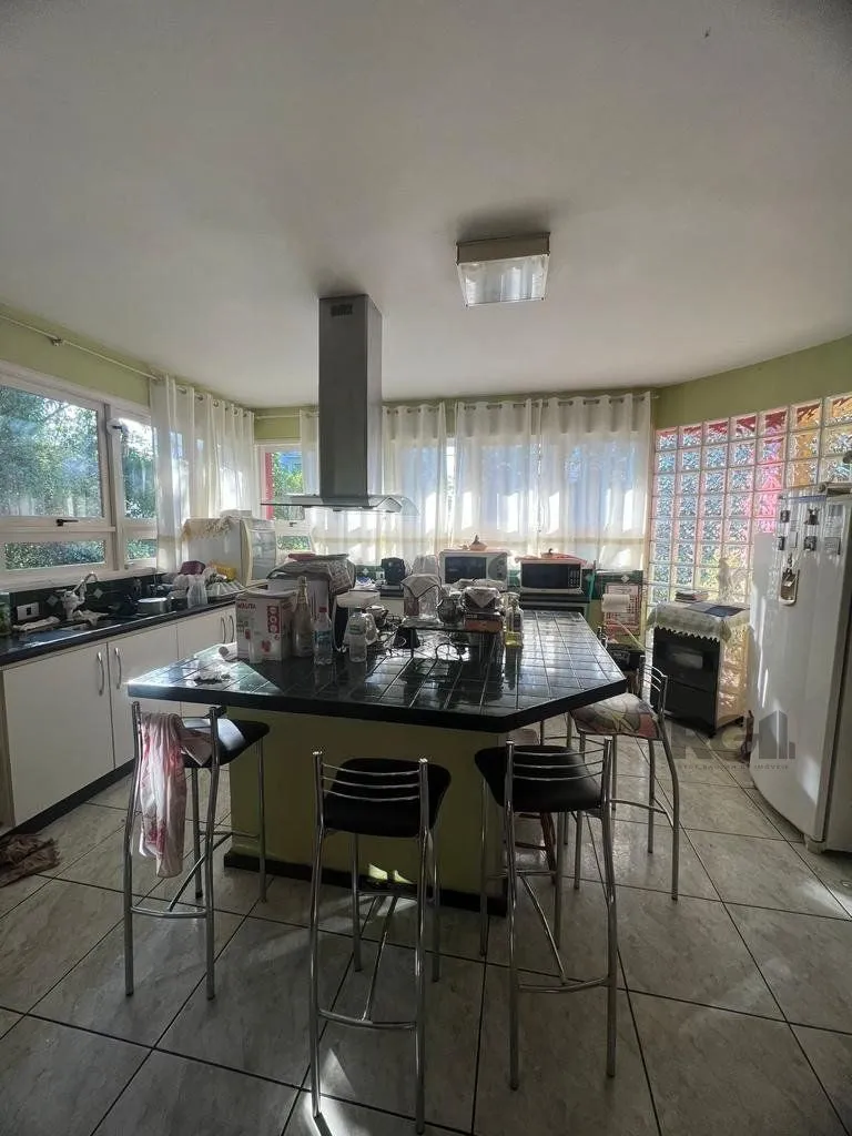 Imagem Casa com 4 quartos, suíte, churrasqueira, vaga de garagem, no bairro Elsa, Viamão/RS