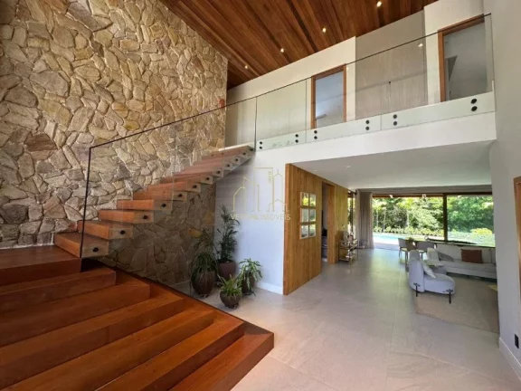 Imagem Com ambientes amplos e moderno essa casa decorada com quatro suítes e área gourmet a venda na Praia do Forte