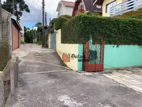 Imagem Sobrado com 4 dormitórios à venda, 259 m² por R$ 1.200.000,00 - Jardim Guararema - Campos do Jordão/SP