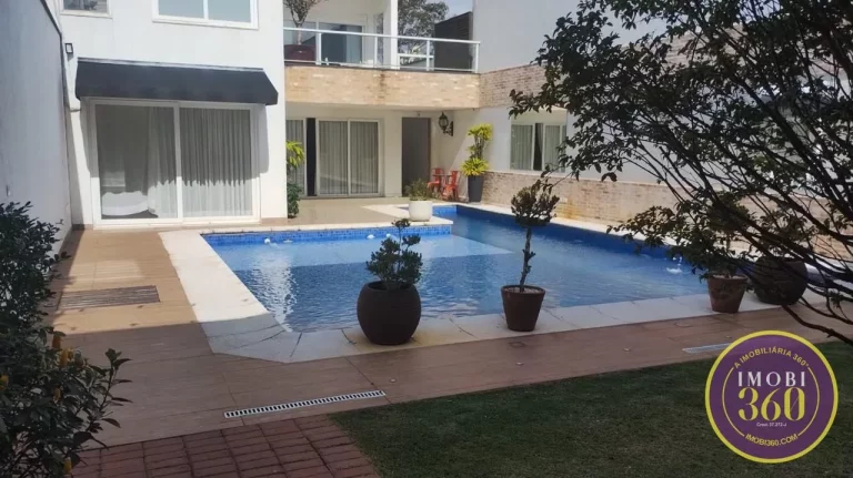 Imagem SOBRADO ALTO PADRÃO 4 SUÍTES SALAS PISICINA CHURRASQUEIRA