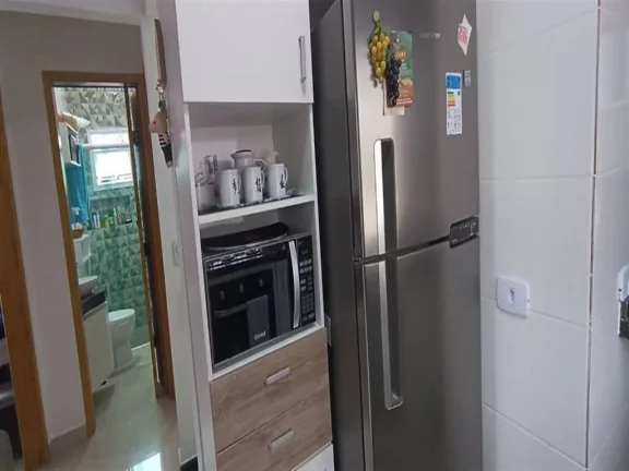 Imagem Casa com 2 dormitórios à venda, 63 m² por R$ 410.000,00 - Mirim - Praia Grande/SP