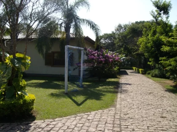 Imagem Chácara com terreno de 2.500m2 e com área construída de 540m2, com duas casas (sede e hóspedes),...