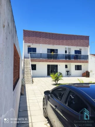 Imagem Sobrado a venda com terreno, 02 pisos, 04 quartos, poucos metros do Mar em Matinhos PR