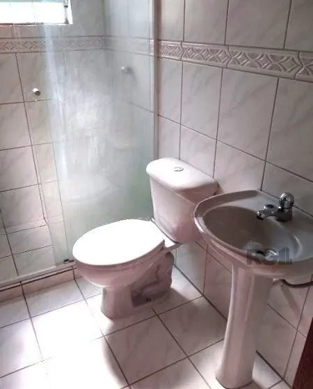 Imagem Casa em condominio no bairro Tristeza de 3 dormitórios e vaga