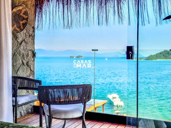 Imagem Casa de Luxo à Beira Mar em Angra dos Reis: 6 Suítes, 7 Salas, 950m² - Piscina, Churrasqueira e Deck Privativo