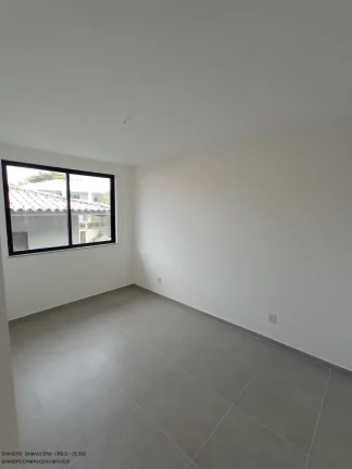 Imagem Luxuosa casa em condomínio à venda em Lauro de Freitas-BA, no bairro Buraquinho, com 4 quartos, 4 suítes, 2 salas, 1 banheiro, 2 vagas de garagem e 350m² de área.