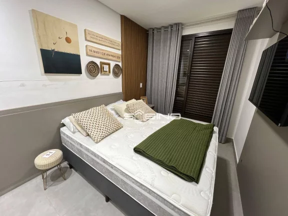 Imagem Imóvel à Venda na Riviera de São Lourenço, Com 2 dormitórios 1 suíte, com 62m² de área útil, 2 vagas de garagem