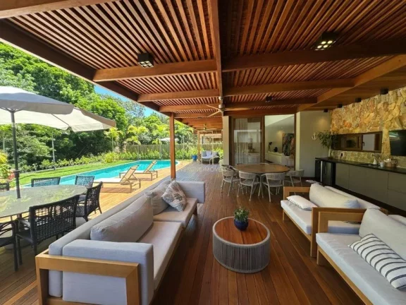 Imagem Com ambientes amplos e moderno essa casa decorada com quatro suítes e área gourmet a venda na Praia do Forte