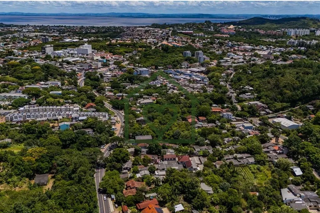 Imagem Terreno na Zona Sul de Porto Alegre, no bairro Vila Nova. Medido 1.069 m² com 11,54 metros de frent...