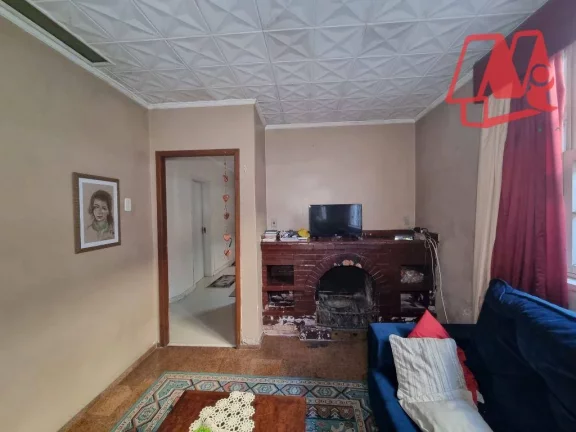 Imagem Casa com 5 dormitórios e pátio próximo à Redenção
