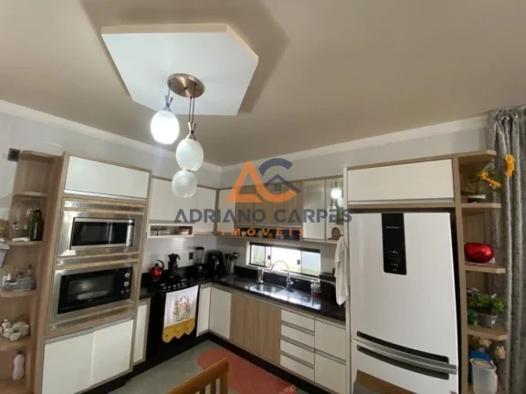 Imagem Imperdível oportunidade de adquirir uma casa em Penha - SC, com 2 quartos, 1 suíte e 127m² de área construída com uma edícula nos fundos a venda pela Adriano Carpes Imóveis