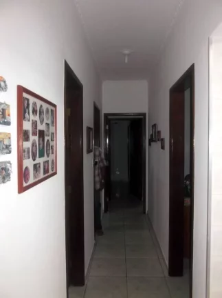 Imagem CASA COM 4 DORMITORIOS (1 SUITES)