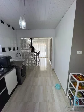 Imagem Casa a venda em condomínio 03 quartos c/suíte, 03 vagas Bairro Guarujá em Colombo -PR