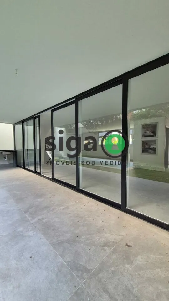 Imagem CASA EM CONDOMINIO COM 4 QUARTOS SENDO SUITES