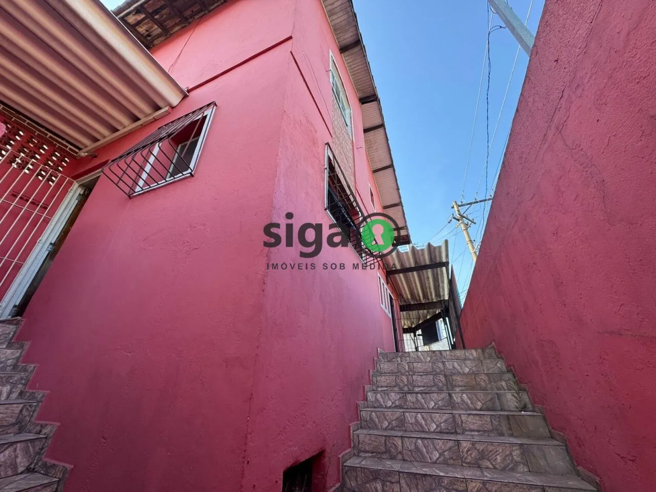 Imagem Sobrado com 2 dormitórios à venda para moradia ou comércio