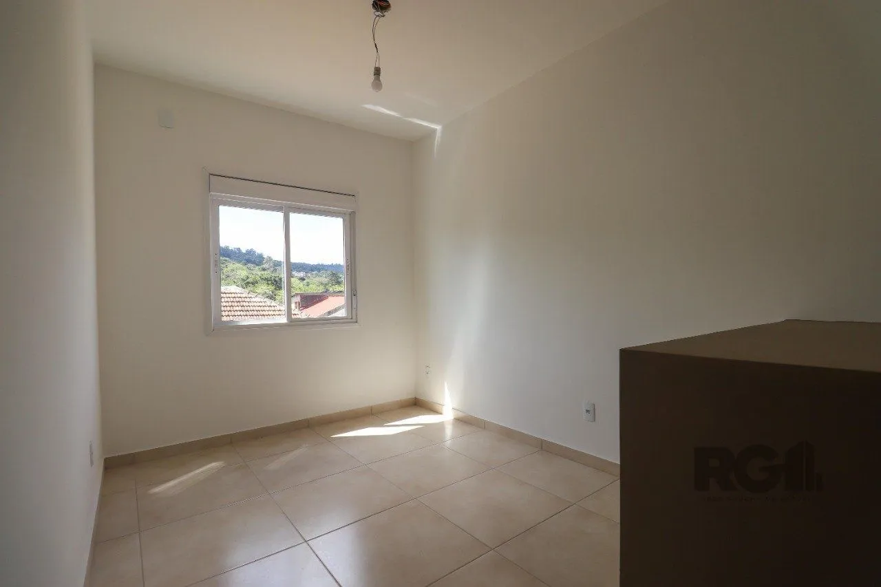 Imagem CASA ESTILO SOBRADO COM 2 QUARTOS E PÁTIO, À VENDA NO BAIRRO VILA NOVA, EM PORTO ALEGRE/RS