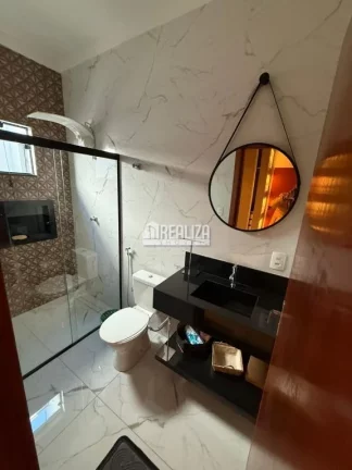 Imagem Casa à venda no Parque das Laranjeiras II em Uberaba - 3 suítes, piscina, varanda gourmet