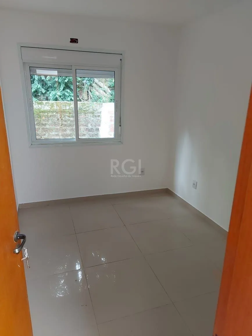 Imagem Casa para Venda - 107.34m², 2 dormitórios, sendo 1 suites, 1 vaga - Aberta dos Morros, Porto Alegre