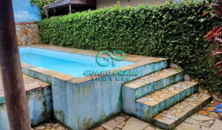 Imagem Casa com 6 quartos sendo 4 suítes, sala de jantar, sala de estar, sala de TV, 5 banheiros, cozinha armário planejado, lavanderia, churrasqueira, piscina, lindo jardim arborizado