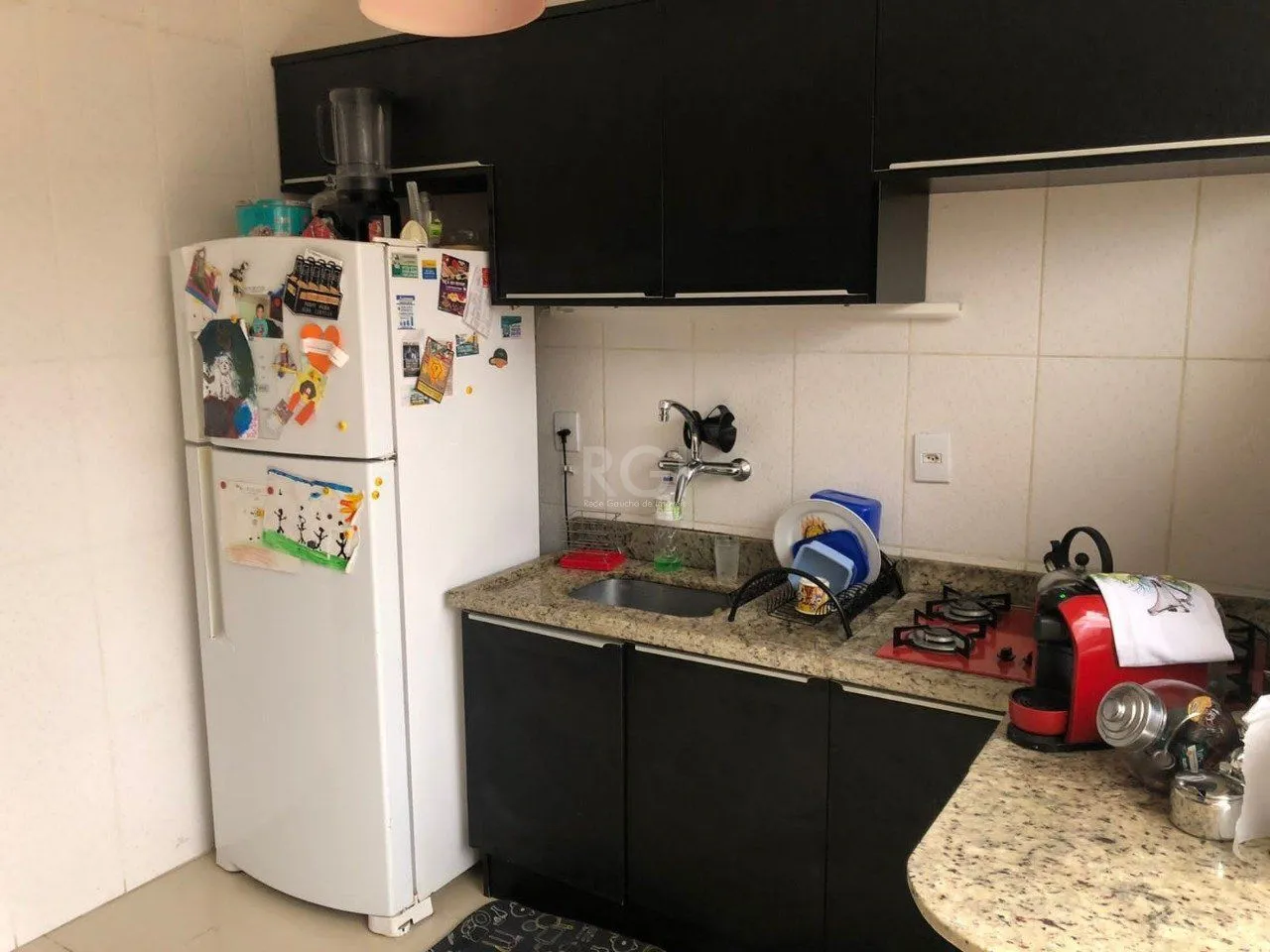 Imagem Casa com 3 dormitórios 2 suítes, área gourmet, vaga de estacionamento, Guarujá, Porto Alegre RS