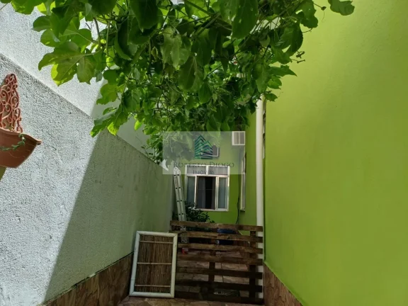 Imagem Imperdível oportunidade! Casa em condomínio à venda no Rio de Janeiro-RJ, 4 quartos, 2 suítes, 2 salas, 3 banheiros, 4 vagas, 230m².