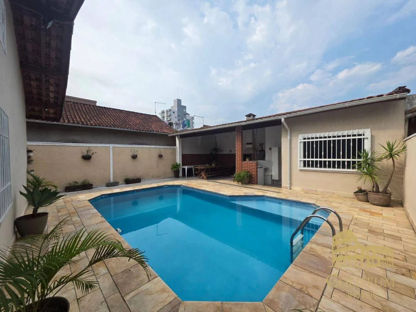 Foto do imóvel Casa com 3 dormitórios à venda, 145 m² por R$ 980.000,00 - Vila Caiçara - Praia Grande/SP