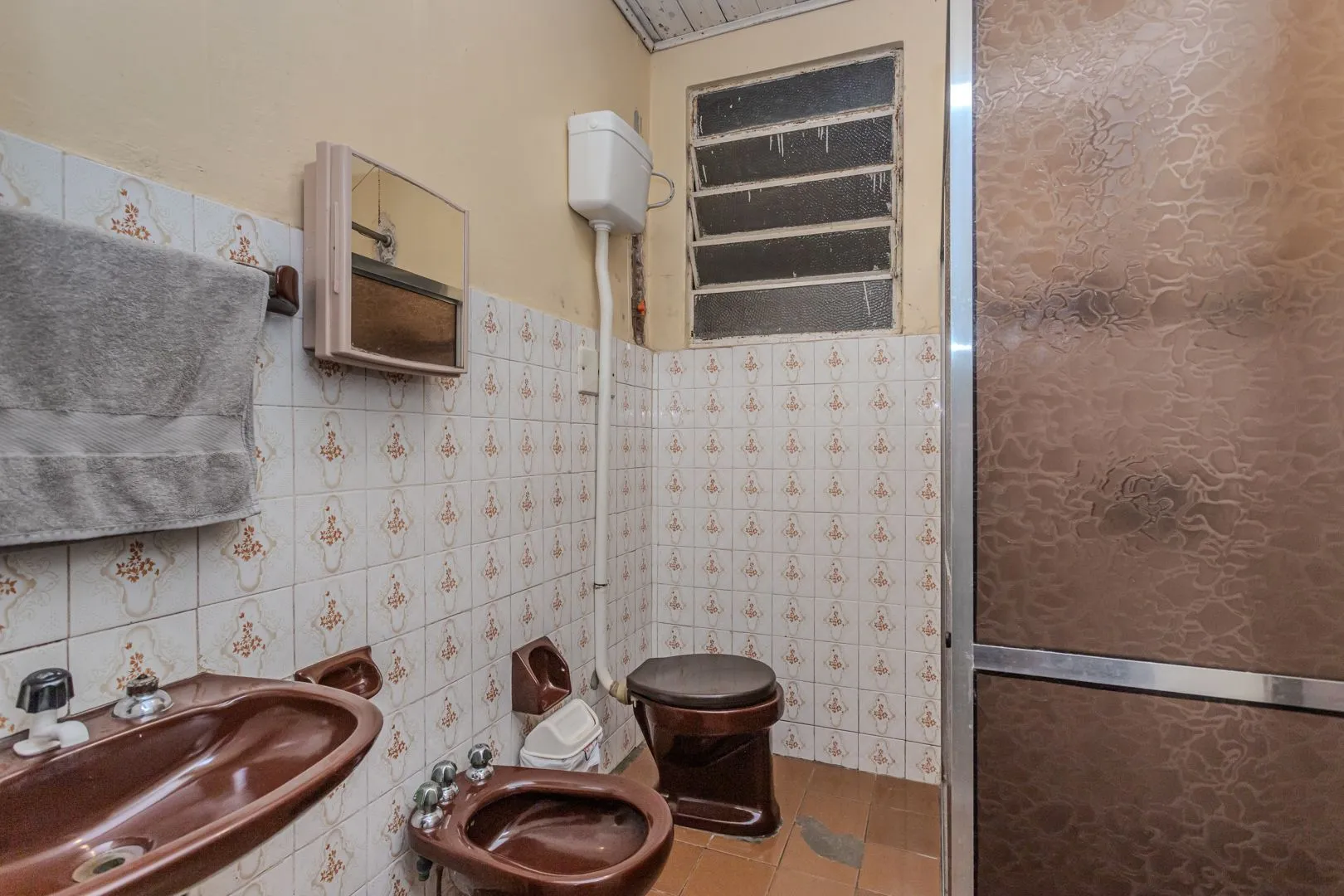 Imagem Casa no bairro Jardim Botânico de 3 dormitórios e garagem e terreno com 370m²