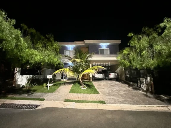 Imagem Esta casa no CondomÃ­nio Madre Maria Villac oferece um projeto amplo e funcional, com quatro dormitÃ...