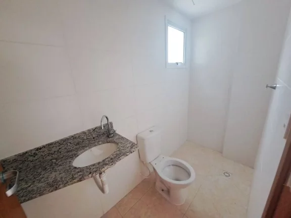Imagem Apartamento com 2 dormitórios à venda, 56 m² por R$ 320.000 - Caiçara - Praia Grande/SP