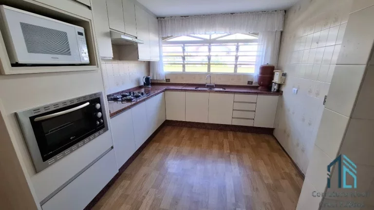 Imagem Casa com amplo terreno, a venda 04 quartos c/suíte no Seminário em Curitiba PR