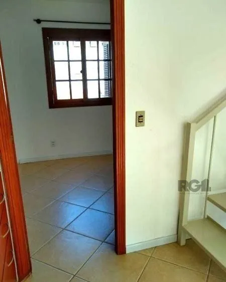 Imagem Casa em condominio no bairro Tristeza de 3 dormitórios e vaga