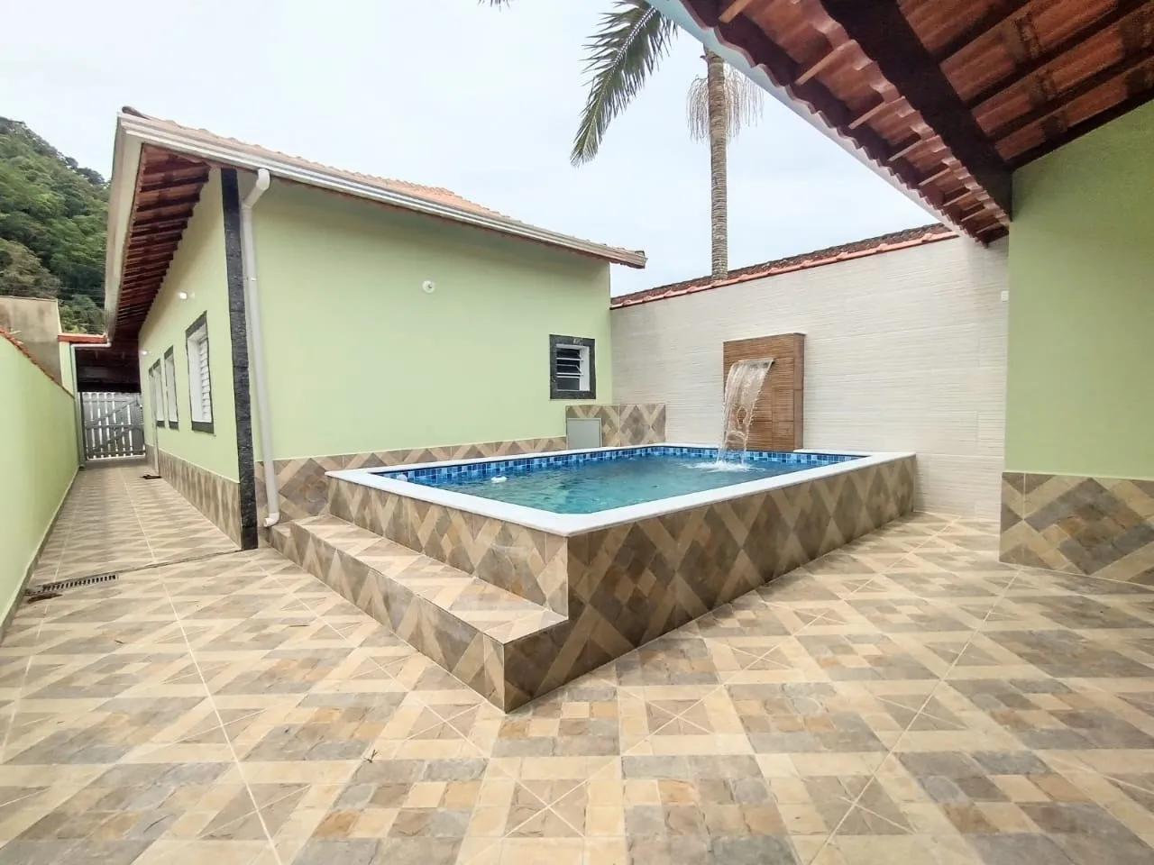 Imagem Casa para Venda em Mongaguá, Itaóca, 2 dormitórios, 1 suíte, 2 banheiros, 2 vagas