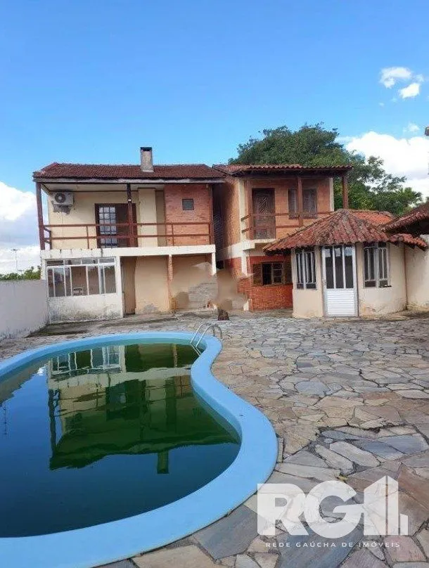 Imagem Linda Residência com cinco dormitórios no centro da cidade de Viamão/RS