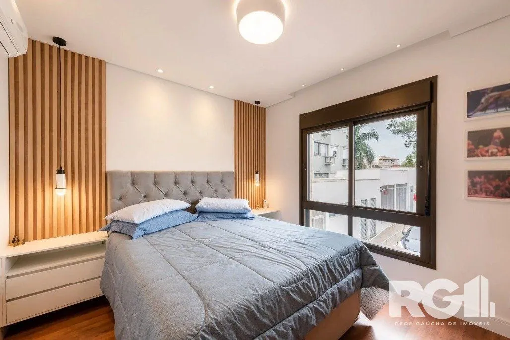 Imagem Apartamento de 3 dormitórios com suíte e churrasqueira, lavabo e 2 vagas de garagem.