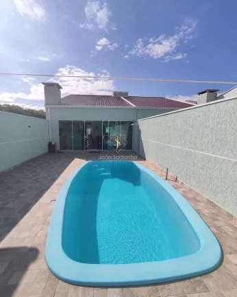 Imagem Casa com piscina para Venda em Guaratuba, 50m do mar, ótimo terreno, bem localizado!