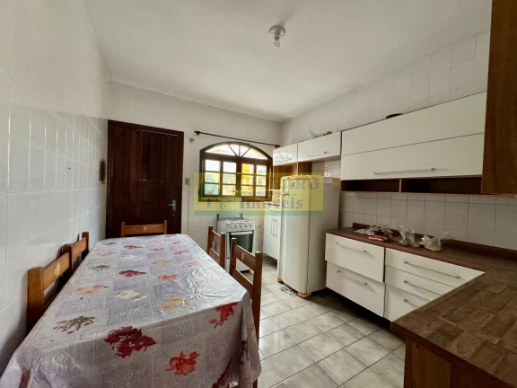 Imagem Sobrado de 2 quartos em condomínio fechado na Martim de Sá, Caraguatatuba-SP: 400mts da Praia, 76m², 1 vaga - Imperdível!