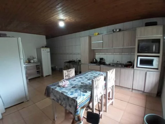 Imagem Sítio com Casa em condomínio Fechado, Próximo da portaria, junto a RS040